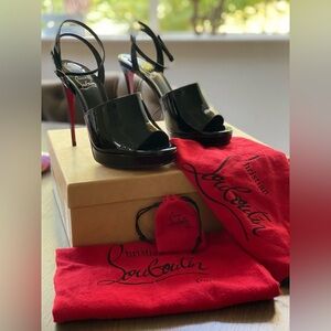 Christian Louboutin Maradona 120. Black patent leather with ankle strap.